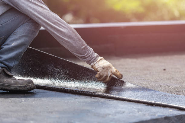Professional Basement Waterproofing technician working in Russells Point, OH